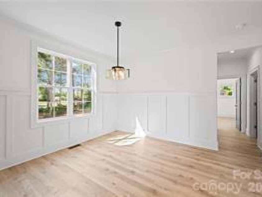 109 Frost Road, Advance, NC 27006.  MLS# CAR4388804, YatesRealty ID 27283. Dining room