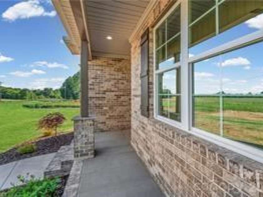 109 Frost Road, Advance, NC 27006.  MLS# CAR4388804, YatesRealty ID 27283. Front porch
