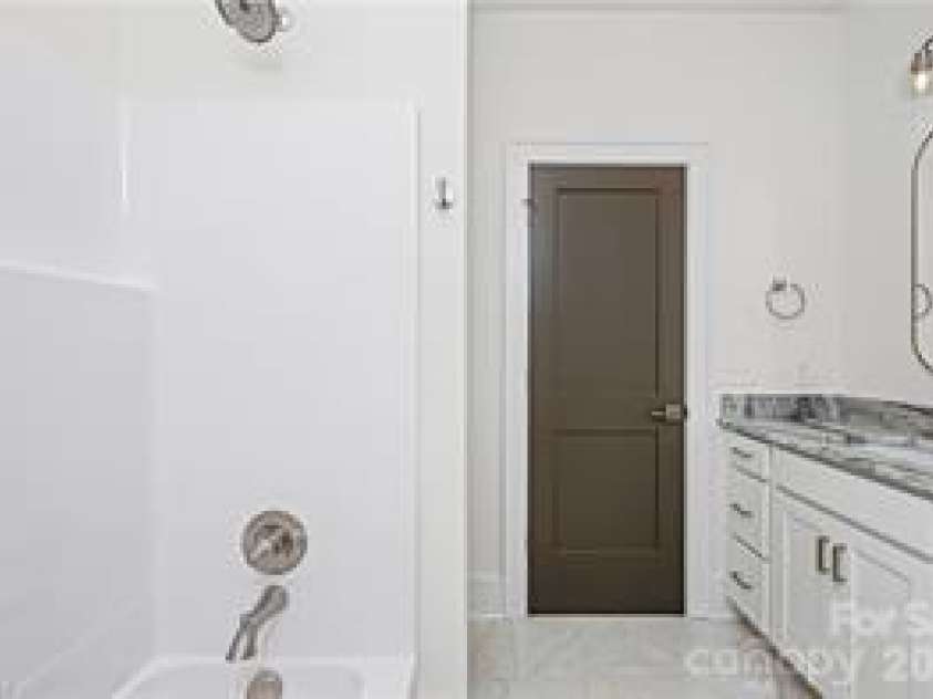 109 Frost Road, Advance, NC 27006.  MLS# CAR4388804, YatesRealty ID 27283. Hall bath