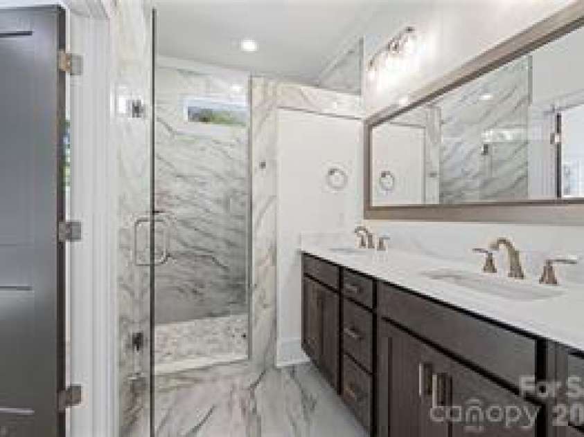 109 Frost Road, Advance, NC 27006.  MLS# CAR4388804, YatesRealty ID 27283. Master bathroom