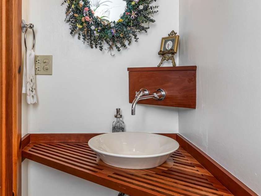 163 Tweetys Knoll, Burnsville, NC 28714.  MLS# CAR4281512, YatesRealty ID 27283. Adorable sink in powder room on main