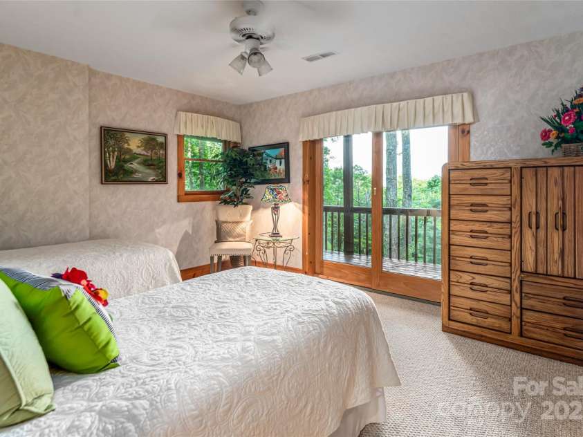 163 Tweetys Knoll, Burnsville, NC 28714.  MLS# CAR4281512, YatesRealty ID 27283. Ensuite bedroom on lower level