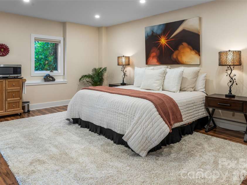 163 Tweetys Knoll, Burnsville, NC 28714.  MLS# CAR4281512, YatesRealty ID 27283. Guest house bed is so cozy!