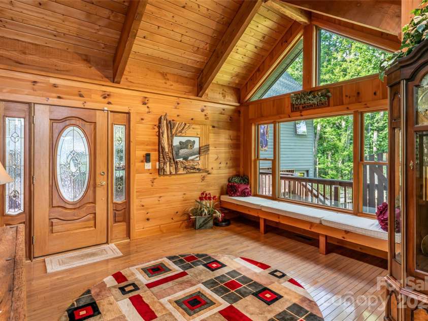 163 Tweetys Knoll, Burnsville, NC 28714.  MLS# CAR4281512, YatesRealty ID 27283. Imagine reading a book here