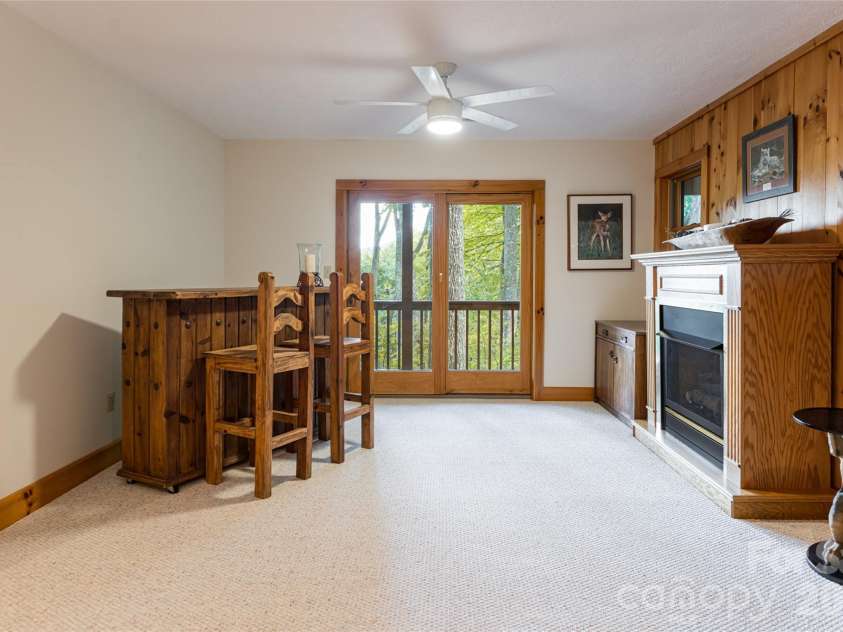 163 Tweetys Knoll, Burnsville, NC 28714.  MLS# CAR4281512, YatesRealty ID 27283. Lower level recc/bonus room opens to lower deck