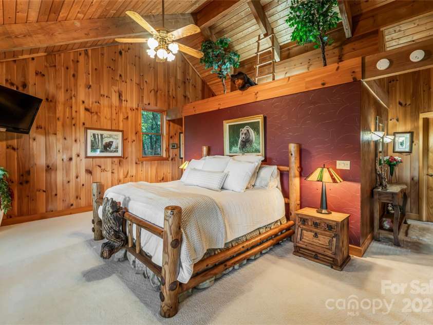 163 Tweetys Knoll, Burnsville, NC 28714.  MLS# CAR4281512, YatesRealty ID 27283. Primary Suite upstairs with vaulted ceilings and private Juliet balcony