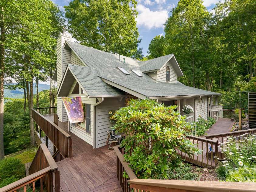 163 Tweetys Knoll, Burnsville, NC 28714.  MLS# CAR4281512, YatesRealty ID 27283. Walkway between garage and main home