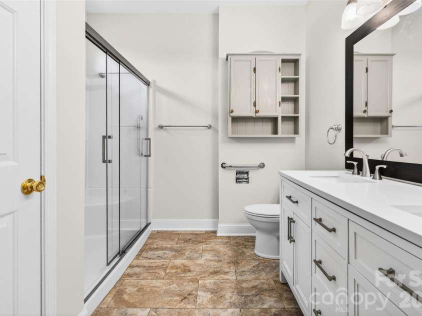 140 Gabriel Drive, Mooresville, NC 28115.  MLS# CAR4380476, YatesRealty ID 27288. Primary bathroom