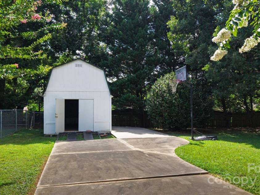 6003 Woodbridge Road, Charlotte, NC 28227.  MLS# CAR4257051, YatesRealty ID 27289. 2 Story Shed