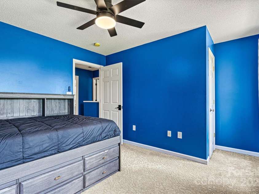 1310 Maple Lee Court, Crouse, NC 28033.  MLS# CAR4278715, YatesRealty ID 27296. Bedroom 3 on upper level with updated fan/lighting.