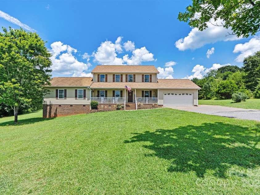 1310 Maple Lee Court, Crouse, NC 28033.  MLS# CAR4278715, YatesRealty ID 27296. Multi-generational living with 4 bedroom main home and in law suite with one bedroom.