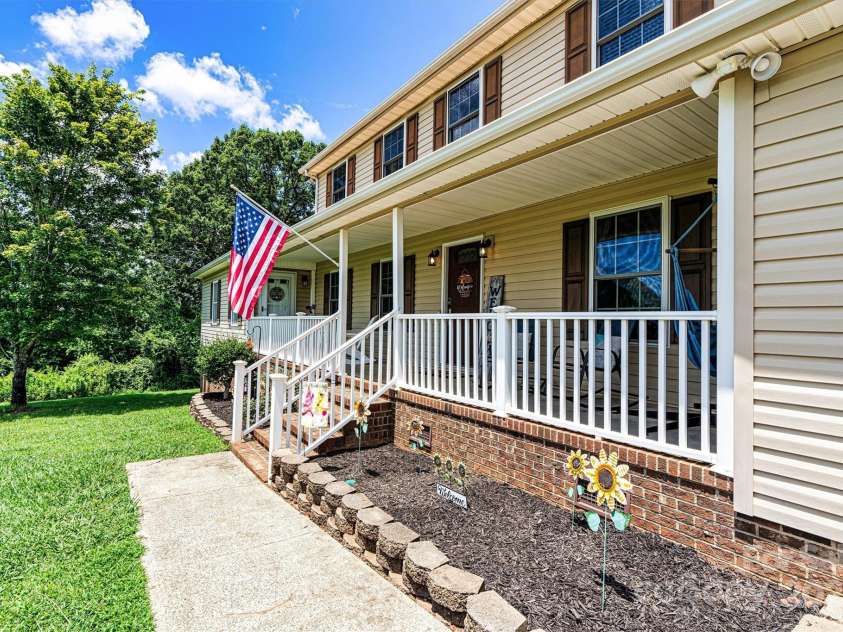 1310 Maple Lee Court, Crouse, NC 28033.  MLS# CAR4278715, YatesRealty ID 27296. Rocking chair front porch is waiting for you!
