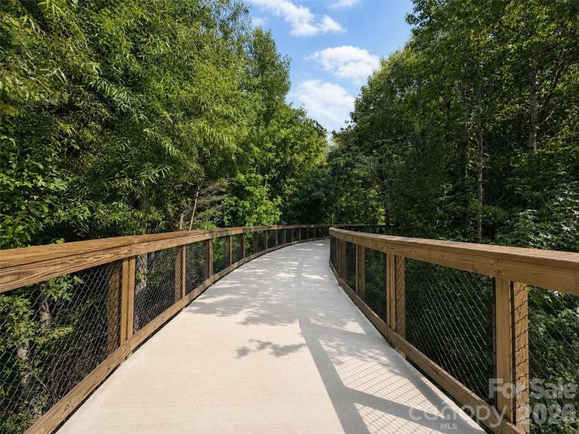 109 Plover Lane, Mooresville, NC 28115.  MLS# CAR4387773, YatesRealty ID 27298. Trees create canopy for shade