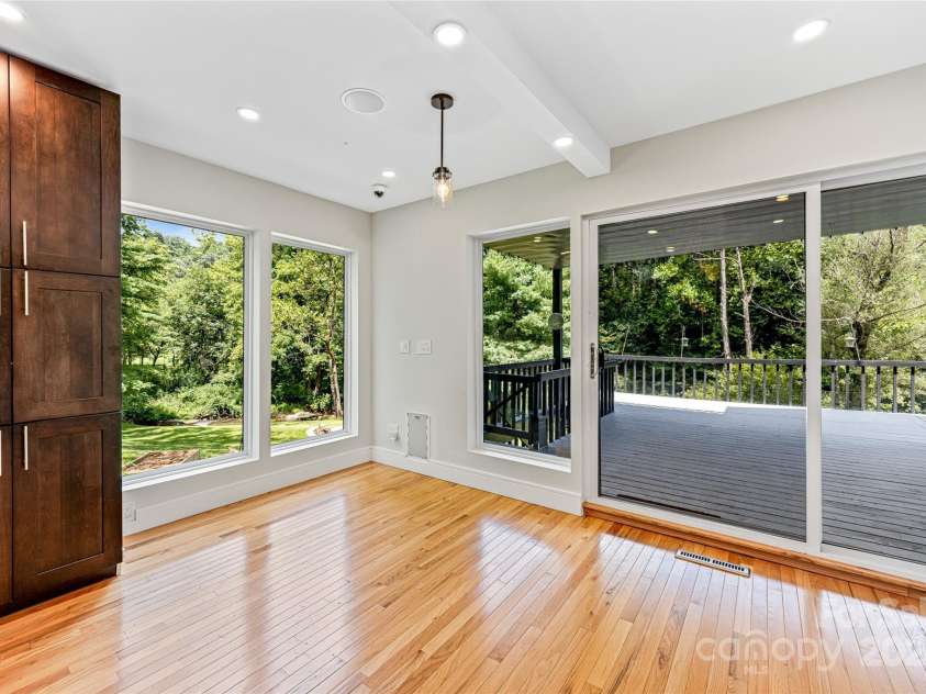 48 Merrell Road, Leicester, NC 28748.  MLS# CAR4172323, YatesRealty ID 2730. Dining area