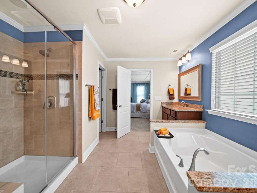 148 Byers Commons Drive, Mooresville, NC 28117.  MLS# CAR4368080, YatesRealty ID 27301. Another view of the spa like owner's suite bath.