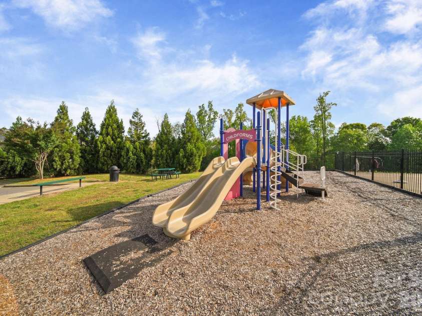 148 Byers Commons Drive, Mooresville, NC 28117.  MLS# CAR4368080, YatesRealty ID 27301. Community playground offering a fun, engaging space for children and families