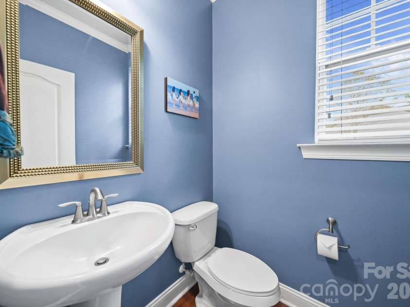 148 Byers Commons Drive, Mooresville, NC 28117.  MLS# CAR4368080, YatesRealty ID 27301. Main level half bath.