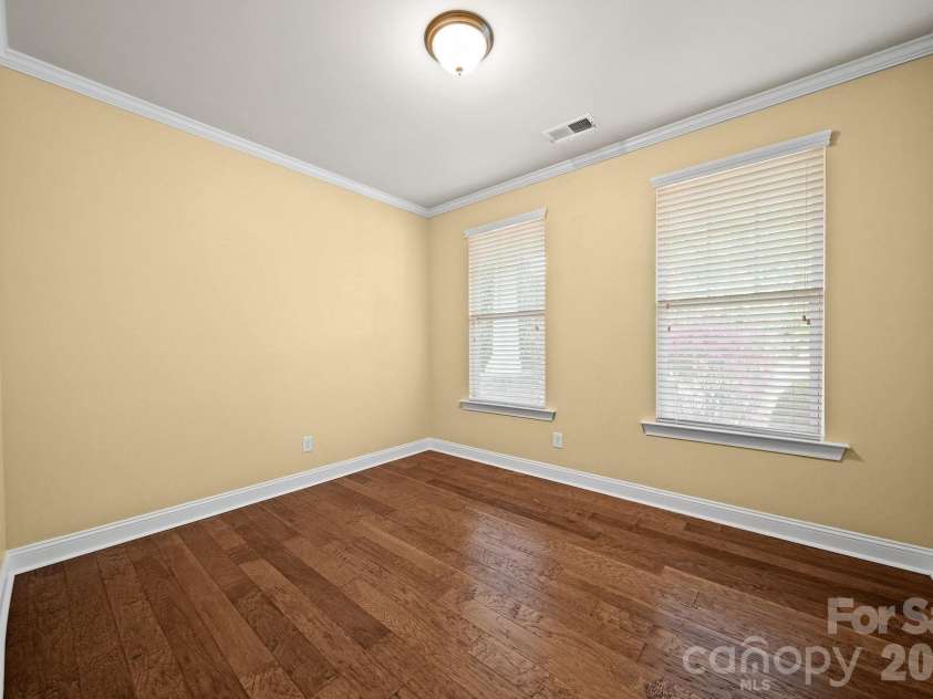 148 Byers Commons Drive, Mooresville, NC 28117.  MLS# CAR4368080, YatesRealty ID 27301. Main level room offering versatile use as a study, home office, or flex space.