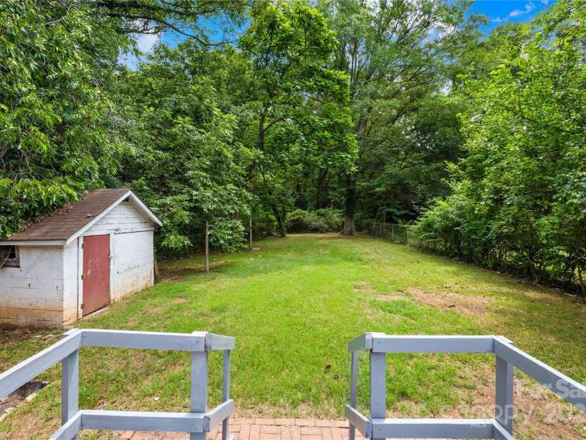 716 Wilson Road, Salisbury, NC 28144.  MLS# CAR4278566, YatesRealty ID 27301. Deck and Backyard