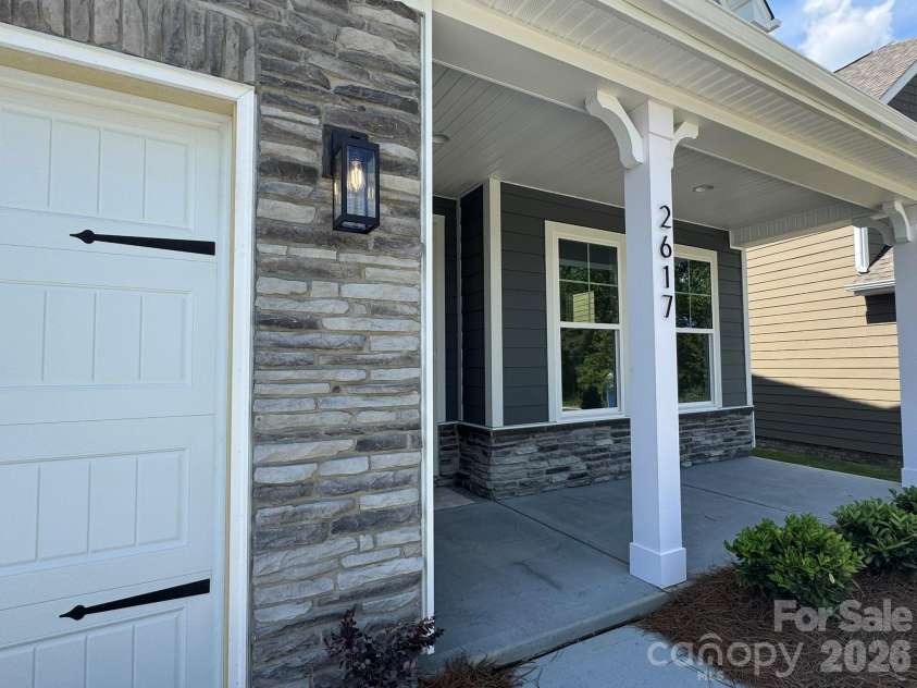 2617 Wild Azalea Court, Monroe, NC 28110.  MLS# CAR4384595, YatesRealty ID 27302. Front porch
