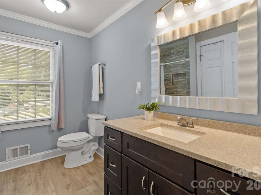 3601 Chapelwood Drive, Gastonia, NC 28052.  MLS# CAR4422096, YatesRealty ID 27303. Guest Bathroom