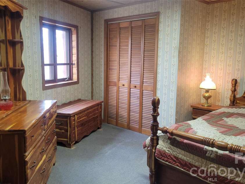 60 Persimmons Lane, Burnsville, NC 28714.  MLS# CAR4287667, YatesRealty ID 2731. Primary Bedroom