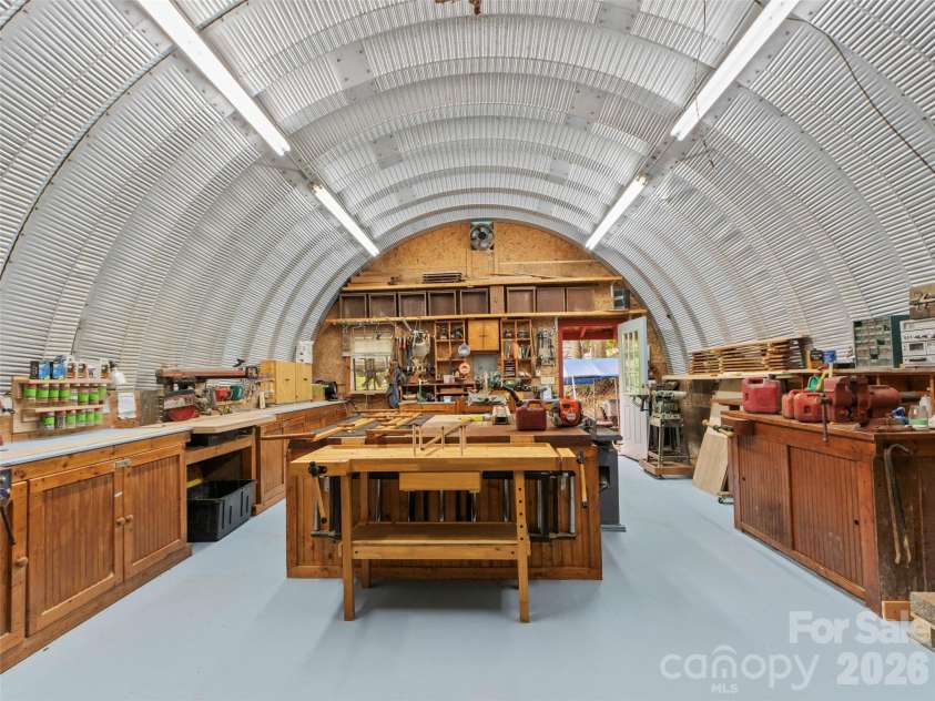 60 Persimmons Lane, Burnsville, NC 28714.  MLS# CAR4287667, YatesRealty ID 2731. Quonset Hut- Wood Workshop