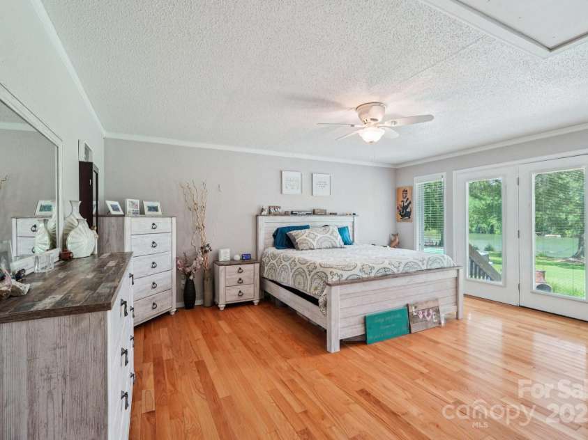 3770 Buck Point Road, Catawba, NC 28609.  MLS# CAR4277174, YatesRealty ID 27311. Spacious primary bedroom with water views.