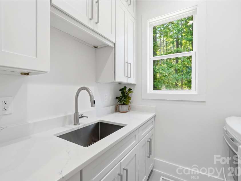 145 Crooked Branch Way, Troutman, NC 28166.  MLS# CAR4385546, YatesRealty ID 27315. Laundry Room