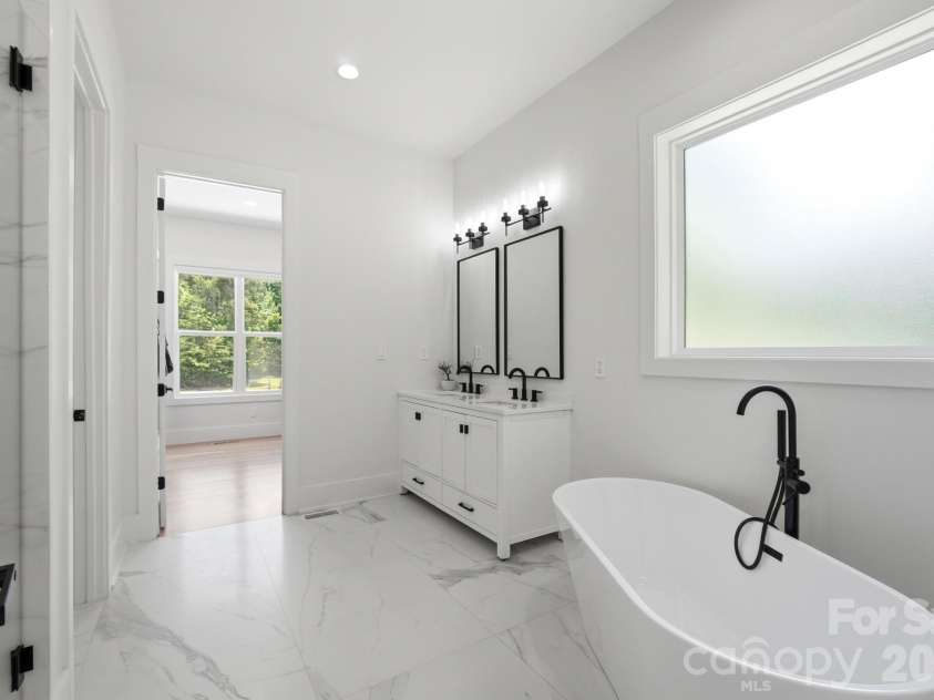 145 Crooked Branch Way, Troutman, NC 28166.  MLS# CAR4385546, YatesRealty ID 27315. Primary Bathroom