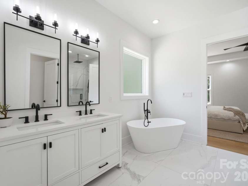 145 Crooked Branch Way, Troutman, NC 28166.  MLS# CAR4385546, YatesRealty ID 27315. Primary Bathroom