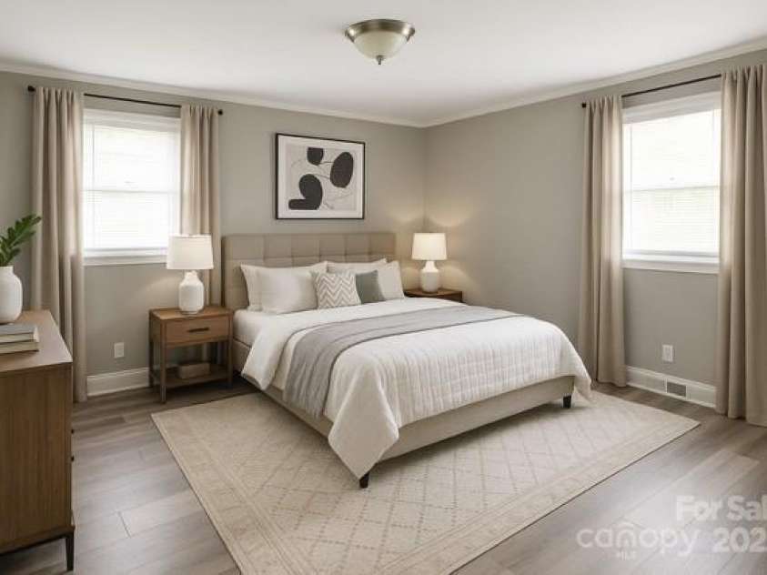 1421 Thompson Avenue, Charlotte, NC 28216.  MLS# CAR4259124, YatesRealty ID 27317. Bedroom 1 master virtually staged