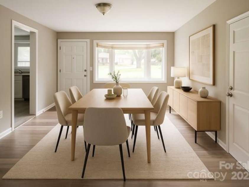 1421 Thompson Avenue, Charlotte, NC 28216.  MLS# CAR4259124, YatesRealty ID 27317. Dinning room virtually staged