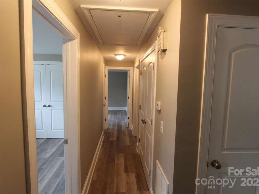 1421 Thompson Avenue, Charlotte, NC 28216.  MLS# CAR4259124, YatesRealty ID 27317. Hall showing all new Luxury Vinyl Plank flooring throughout house