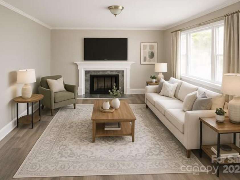 1421 Thompson Avenue, Charlotte, NC 28216.  MLS# CAR4259124, YatesRealty ID 27317. Living room virtually staged