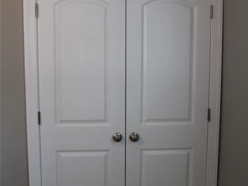 1421 Thompson Avenue, Charlotte, NC 28216.  MLS# CAR4259124, YatesRealty ID 27317. New arched panel doors with 3-1/4