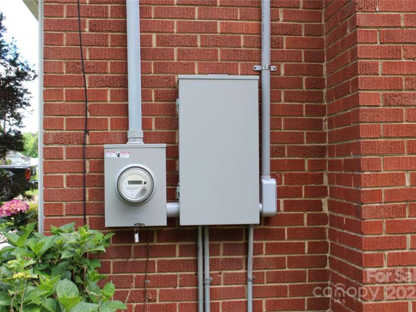 1421 Thompson Avenue, Charlotte, NC 28216.  MLS# CAR4259124, YatesRealty ID 27317. New main power and meter