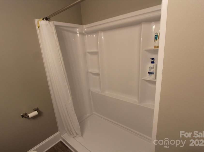 1421 Thompson Avenue, Charlotte, NC 28216.  MLS# CAR4259124, YatesRealty ID 27317. New walk in shower