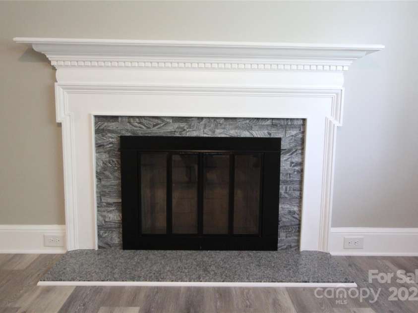 1421 Thompson Avenue, Charlotte, NC 28216.  MLS# CAR4259124, YatesRealty ID 27317. Newly finished fireplace