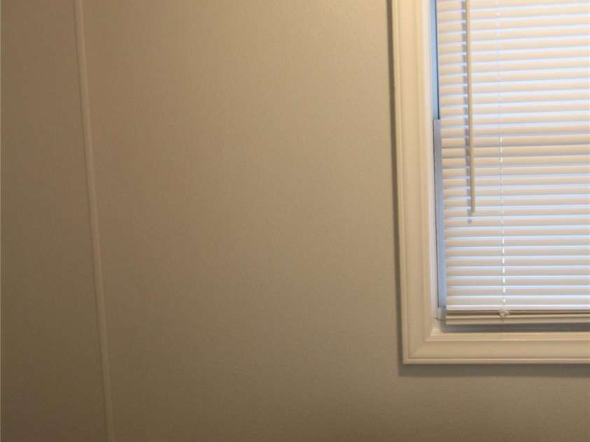 1421 Thompson Avenue, Charlotte, NC 28216.  MLS# CAR4259124, YatesRealty ID 27317. View of heavy duty commercial grade FRP panels on all walls and ceiling in laundy room