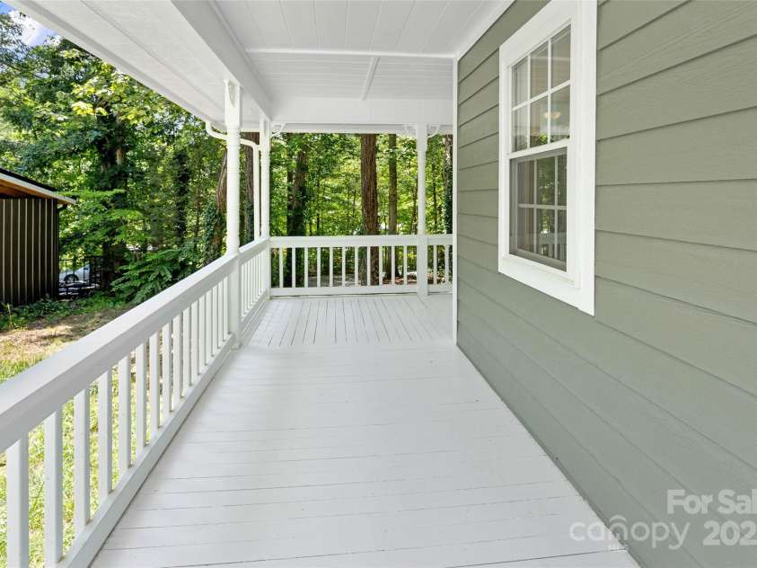 233 Youngs Cove Road, Candler, NC 28715.  MLS# CAR4277512, YatesRealty ID 27324. 