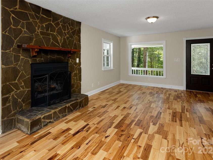 233 Youngs Cove Road, Candler, NC 28715.  MLS# CAR4277512, YatesRealty ID 27324. 