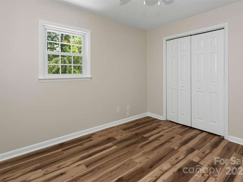 233 Youngs Cove Road, Candler, NC 28715.  MLS# CAR4277512, YatesRealty ID 27324. 