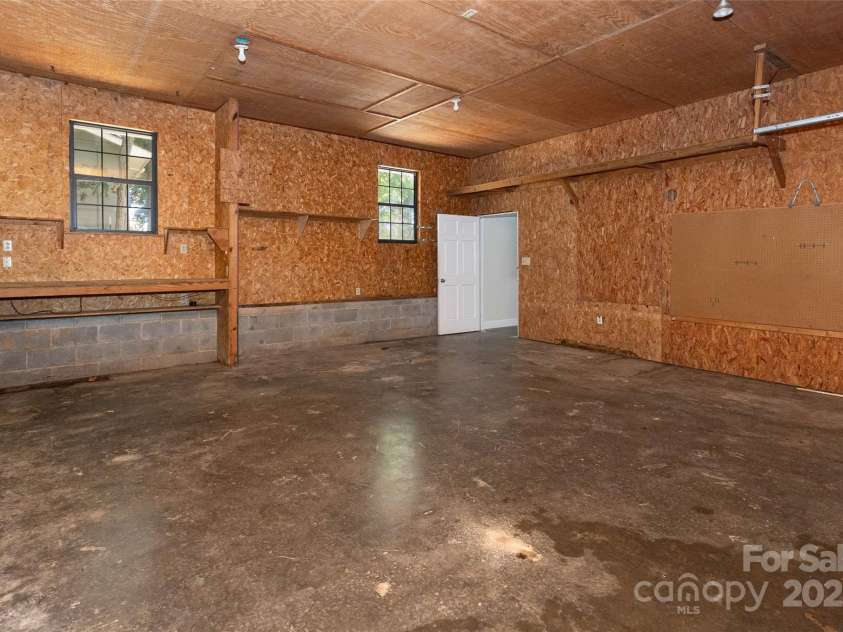 233 Youngs Cove Road, Candler, NC 28715.  MLS# CAR4277512, YatesRealty ID 27324. 