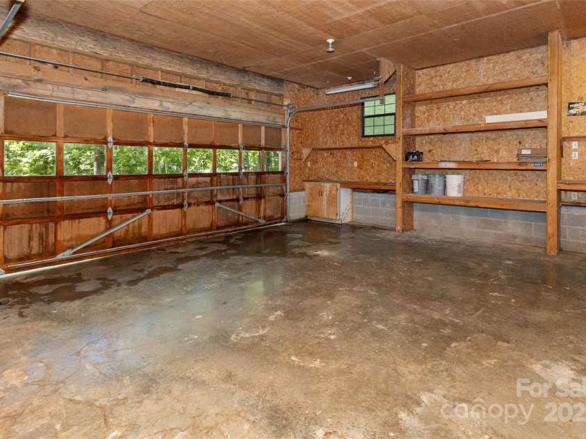 233 Youngs Cove Road, Candler, NC 28715.  MLS# CAR4277512, YatesRealty ID 27324. 