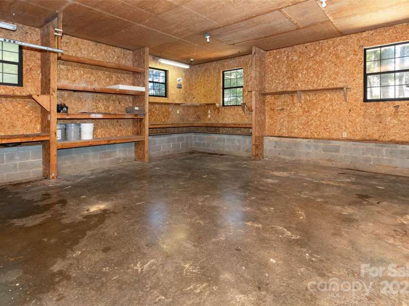 233 Youngs Cove Road, Candler, NC 28715.  MLS# CAR4277512, YatesRealty ID 27324. 