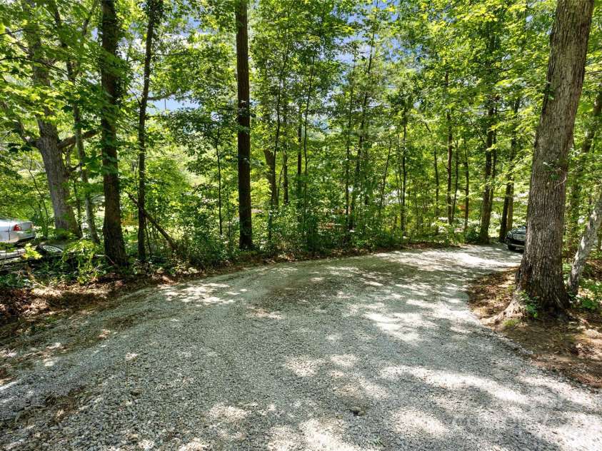 233 Youngs Cove Road, Candler, NC 28715.  MLS# CAR4277512, YatesRealty ID 27324. 