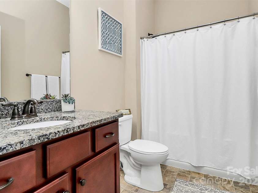 1397 Tupelo Road, Clover, SC 29710.  MLS# CAR4267645, YatesRealty ID 27327. Downstairs bathroom