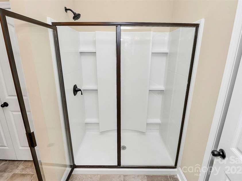 1397 Tupelo Road, Clover, SC 29710.  MLS# CAR4267645, YatesRealty ID 27327. Primary shower