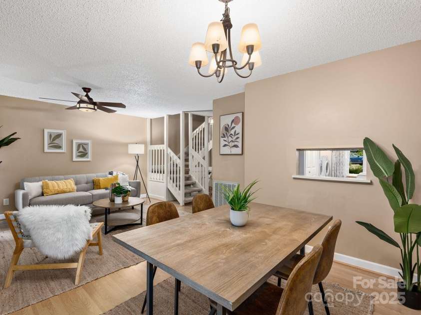 42 Hollybrook Drive, Asheville, NC 28803.  MLS# CAR4256176, YatesRealty ID 27329. Dining and living areas flow effortlessly for gathering and entertaining